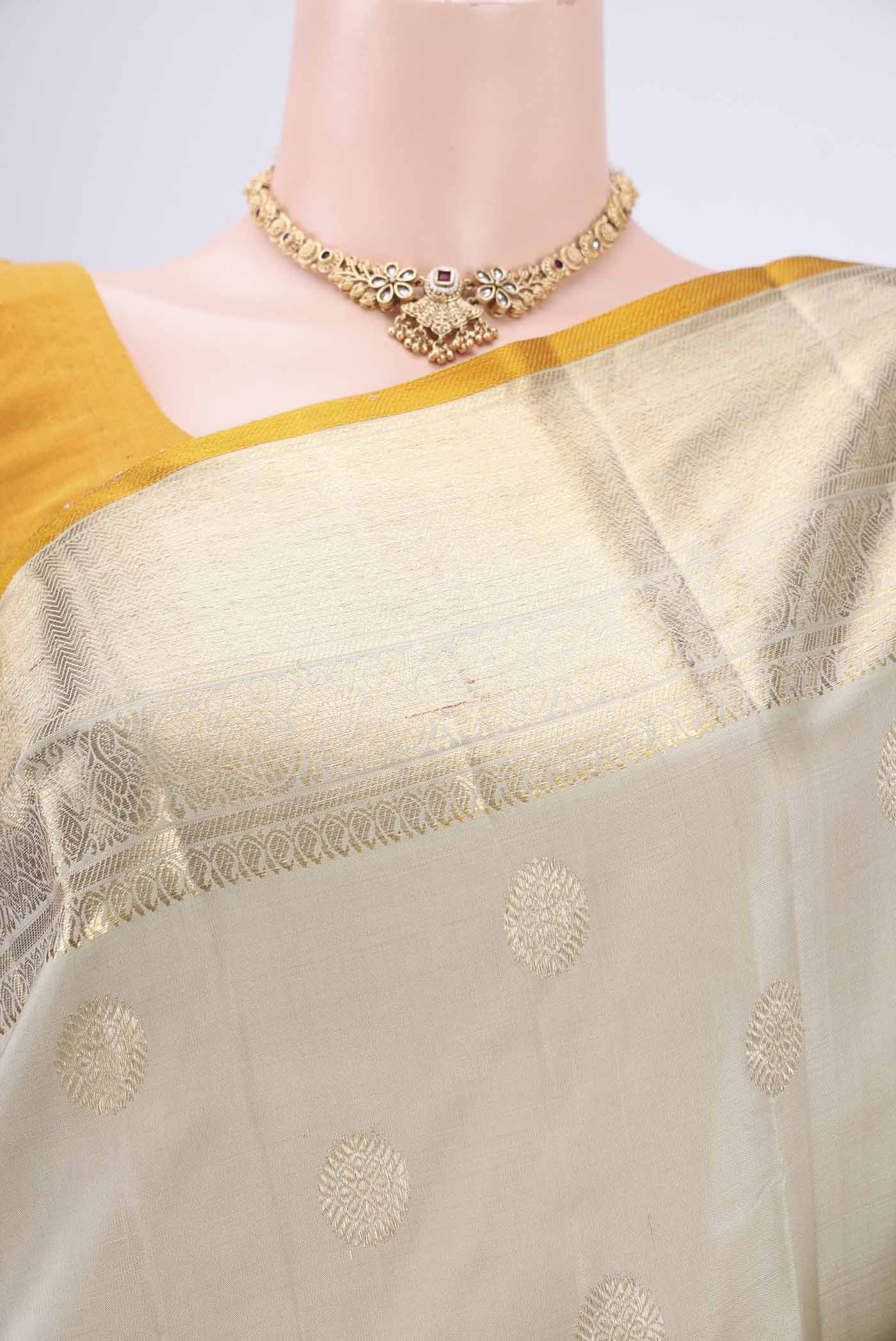 Border image of Sage Green Kanjivaram Silk Saree with Zari Butta on the body and Zari Border. 