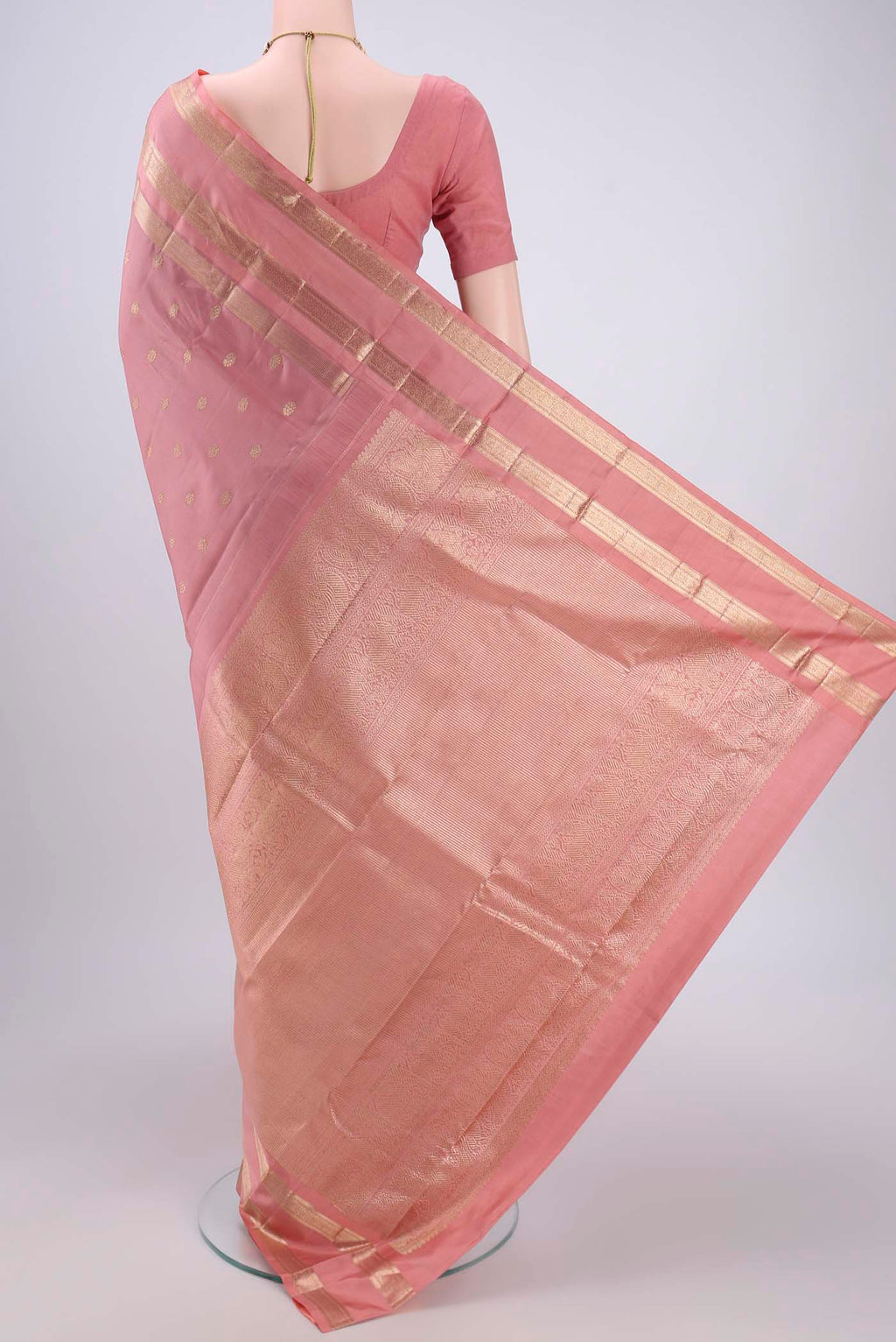 Flat view of Mauve Kanjivaram Silk Saree with Zari Butta on the body and Zari Border. 