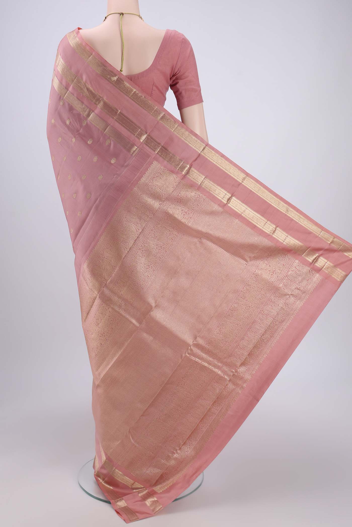 Flat view of Mauve Kanjivaram Silk Saree with Zari Butta on the body and Zari Border. 