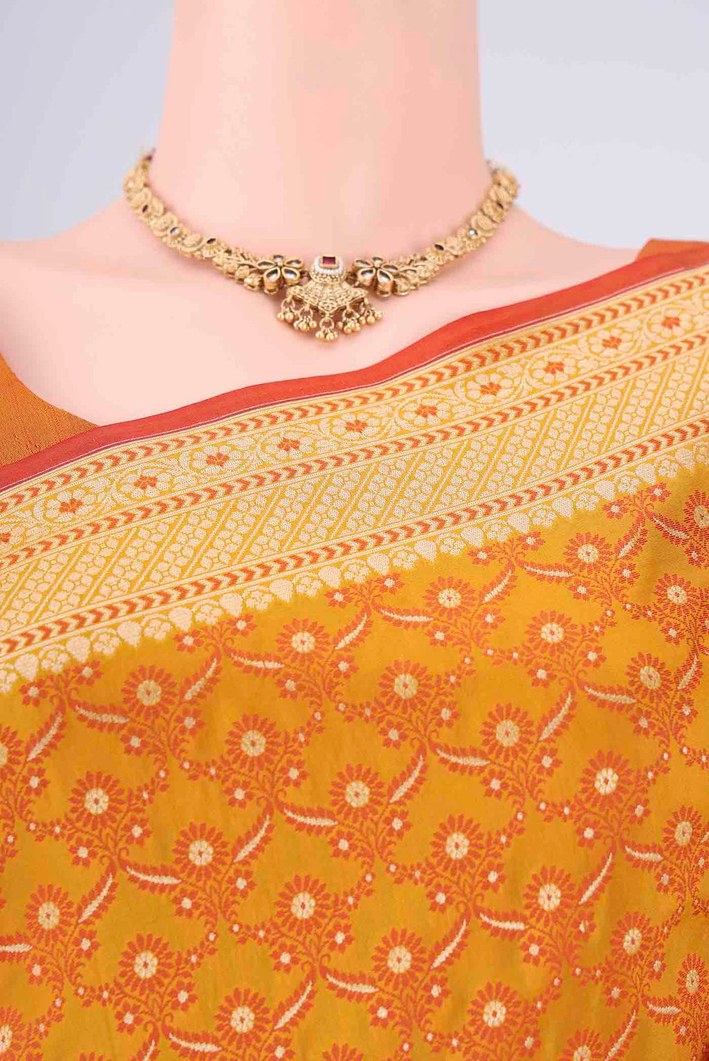 Border image of Mustard Banarasi Silk Saree with Jacquard With Zari Butta on the body and Zari Border. 