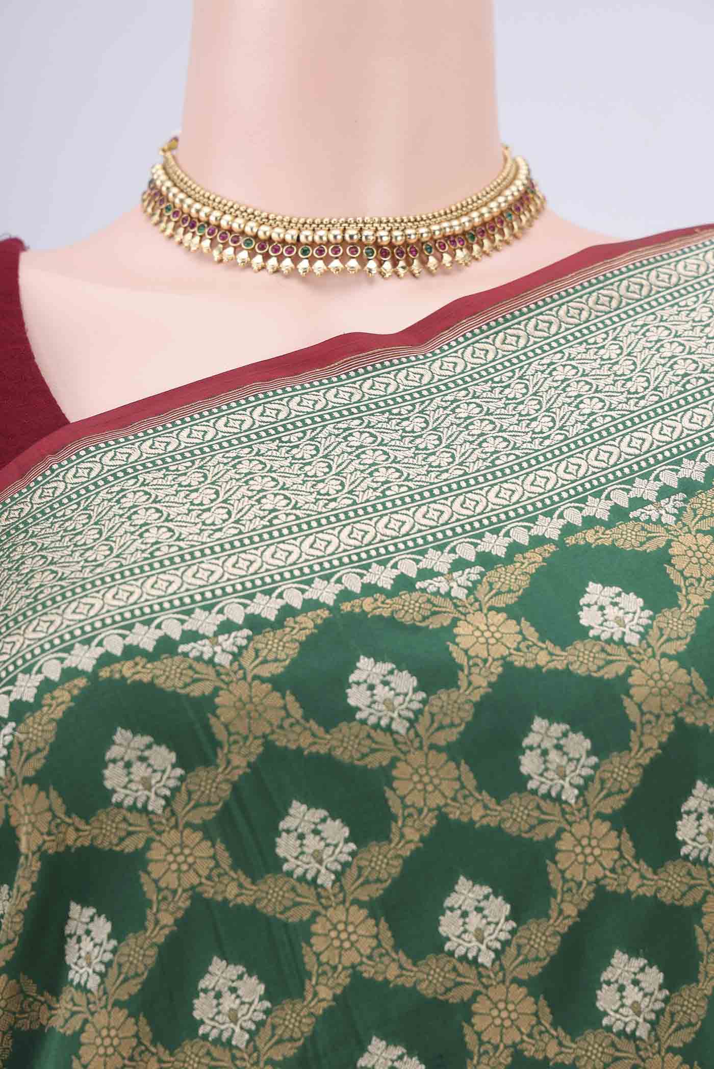 Border image of Green Dual Tone Banarasi Silk Saree with Jacquard With Zari Butta on the body and Zari Border. 