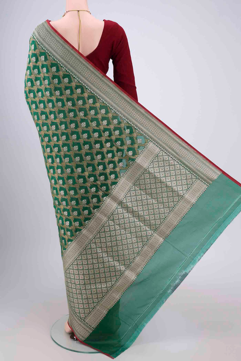 Flat view of Green Dual Tone Banarasi Silk Saree with Jacquard With Zari Butta on the body and Zari Border. 