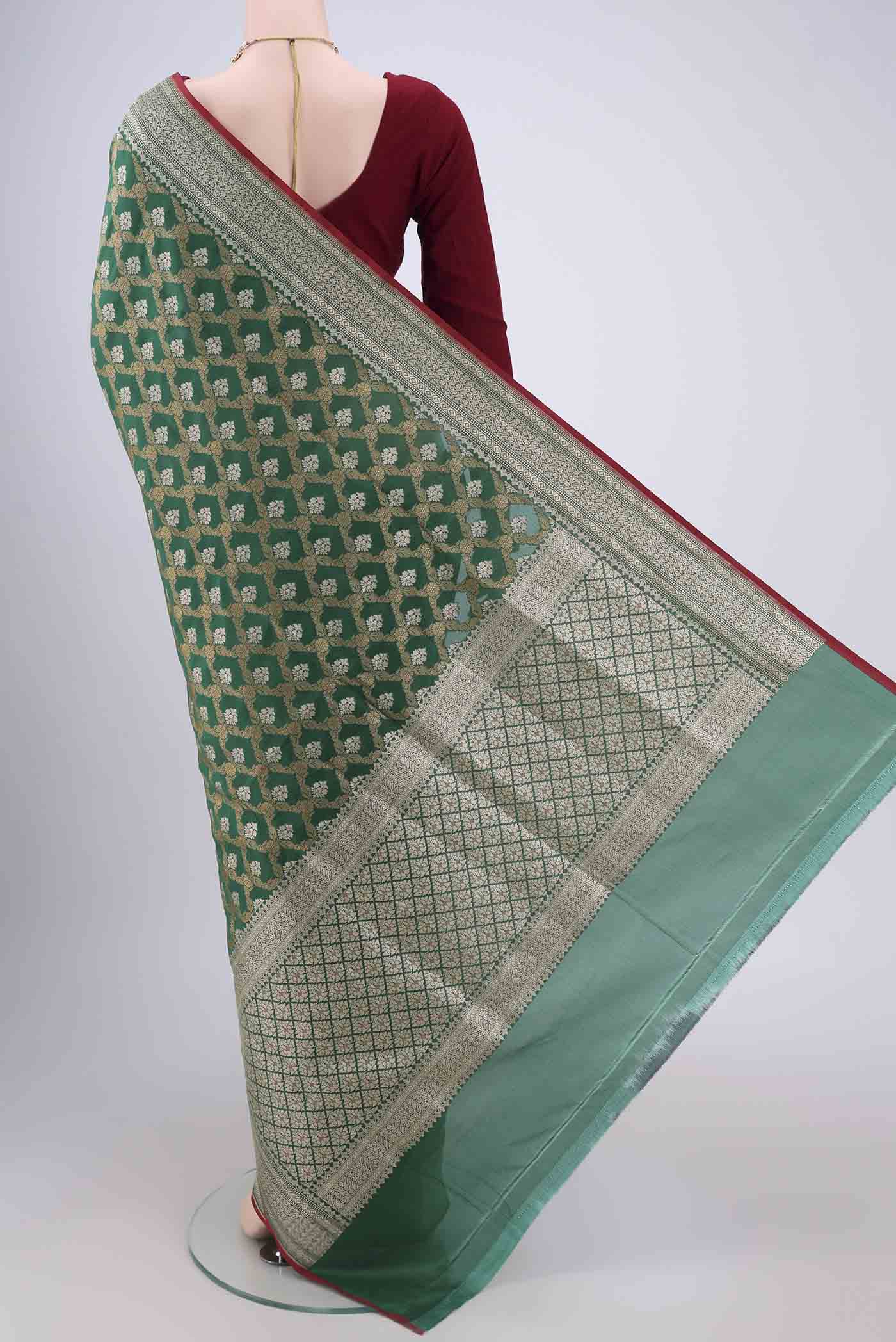 Flat view of Green Dual Tone Banarasi Silk Saree with Jacquard With Zari Butta on the body and Zari Border. 
