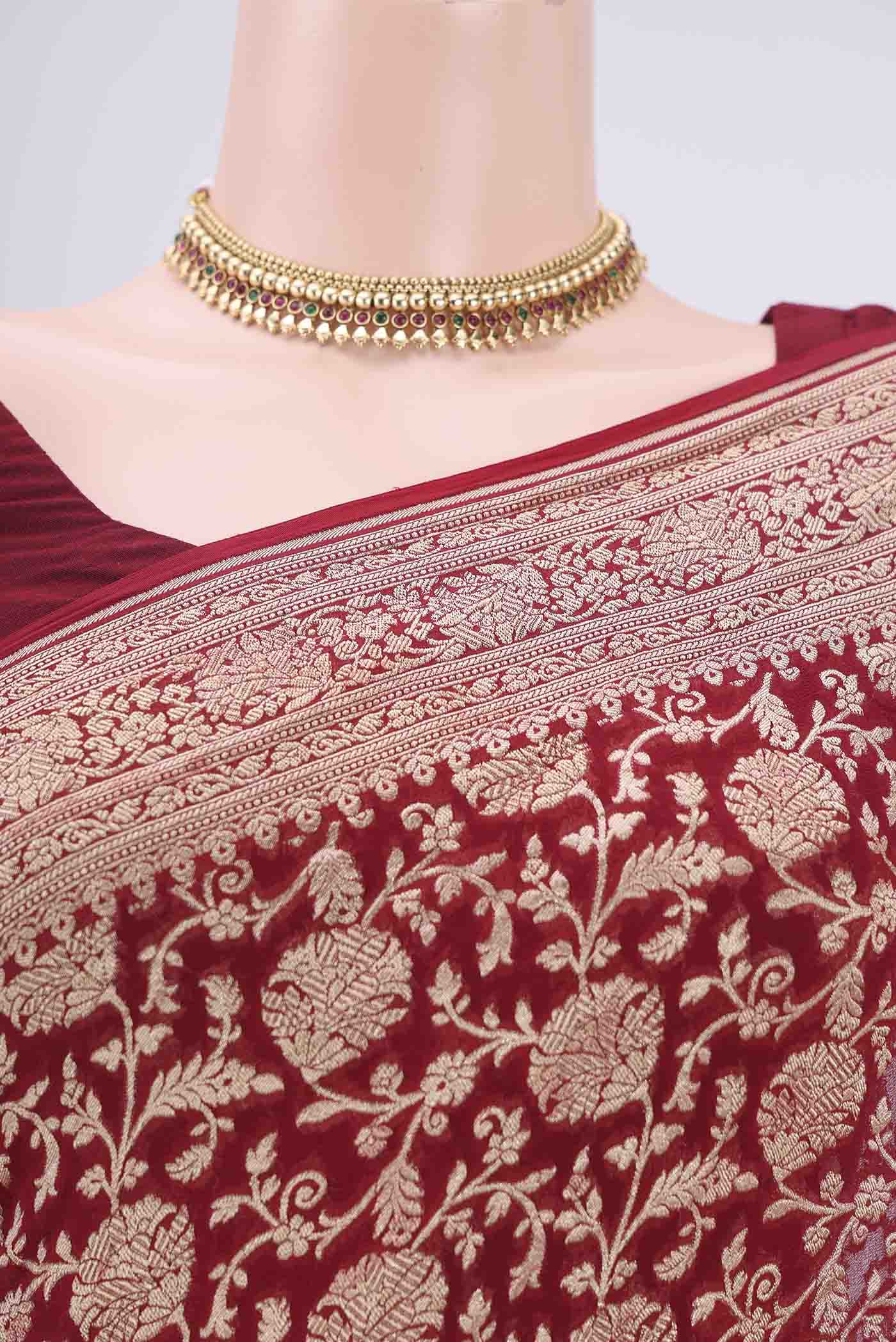 Border image of Maroon Banarasi Georgette Saree with Zari Brocade on the body and Zari Border. 