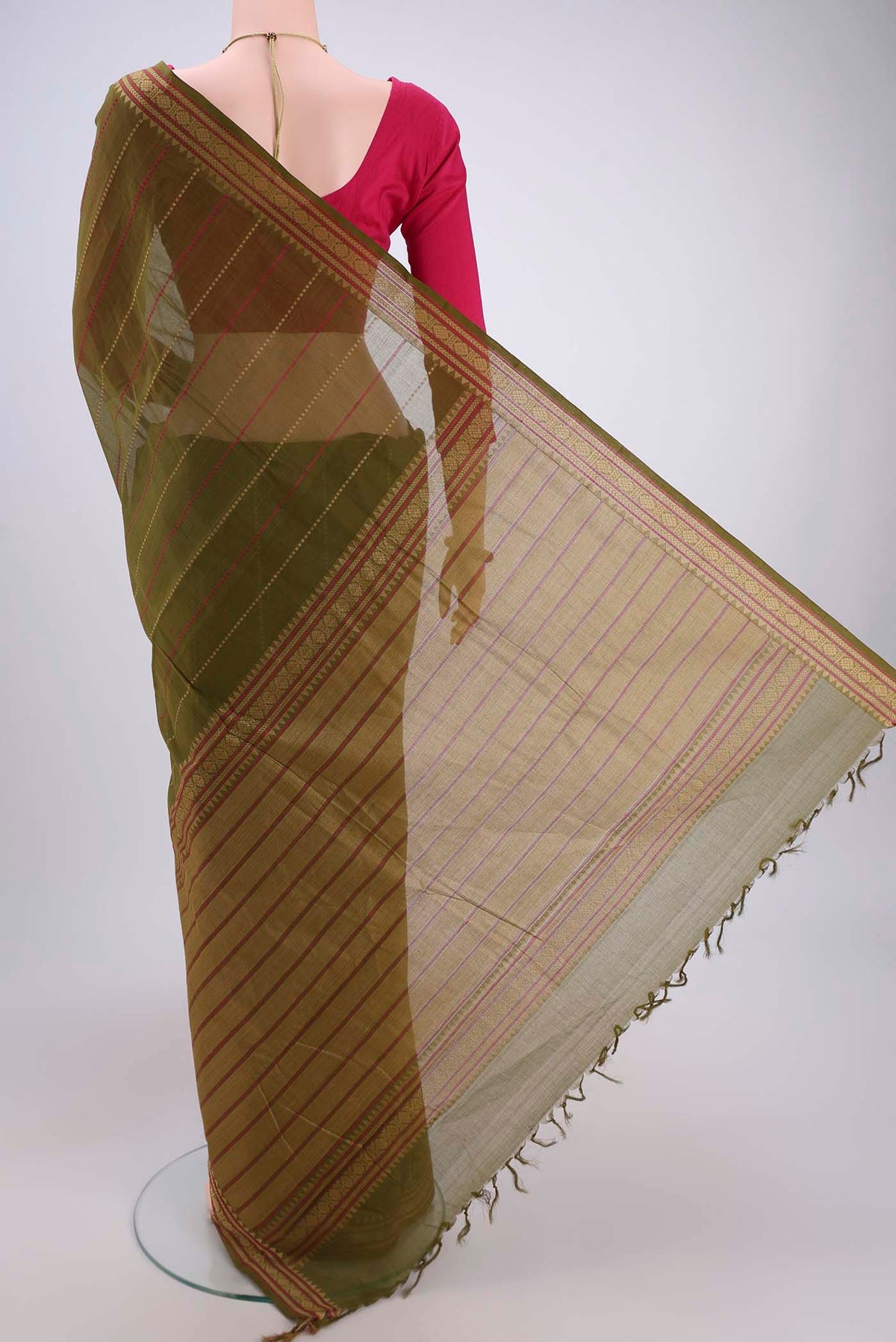 Flat view of Olive Green Kanchi Cotton Saree with Stripes on the body and Thread Border. 