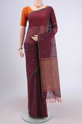 Brown Coimbatore Cotton Saree with Thread Butta on the body and Thread Border.  displayed on a mannequin