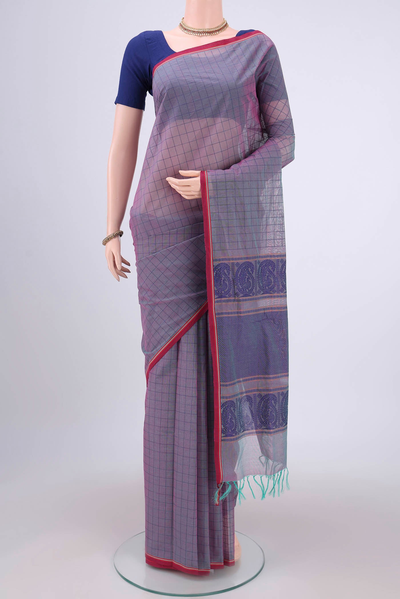 Purple Coimbatore Cotton Saree with Thread Butta on the body and Thread Border.  displayed on a mannequin
