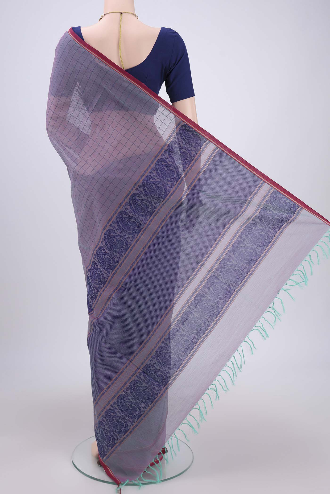 Flat view of Purple Coimbatore Cotton Saree with Thread Butta on the body and Thread Border. 