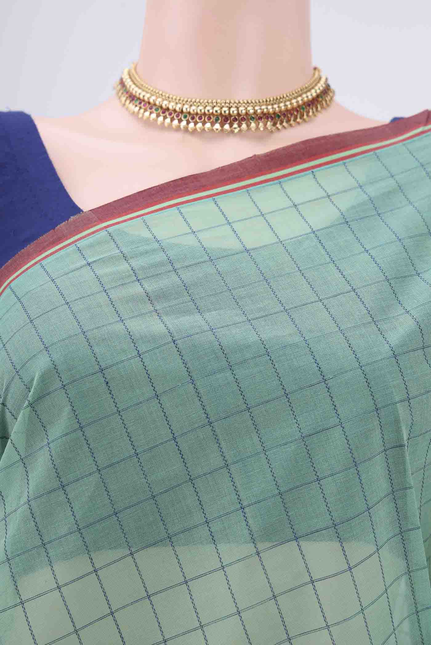 Border image of Mint Green Coimbatore Cotton Saree with Thread Butta on the body and Thread Border. 