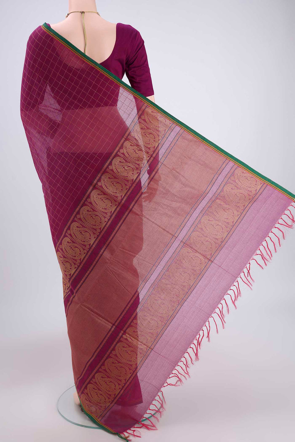 Flat view of Magenta Coimbatore Cotton Saree with Thread Butta on the body and Thread Border. 