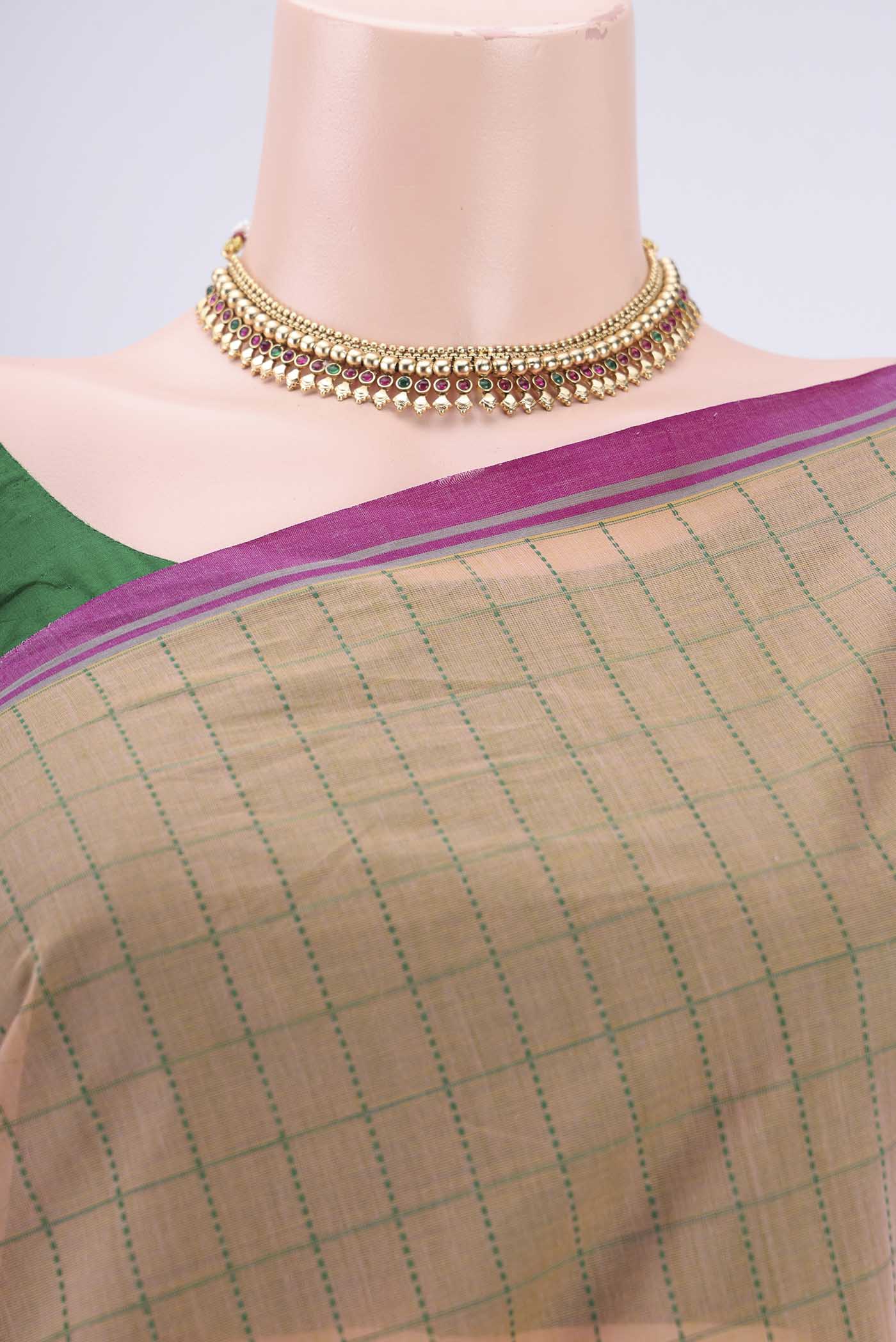 Border image of Beige Coimbatore Cotton Saree with Thread Butta on the body and Thread Border. 