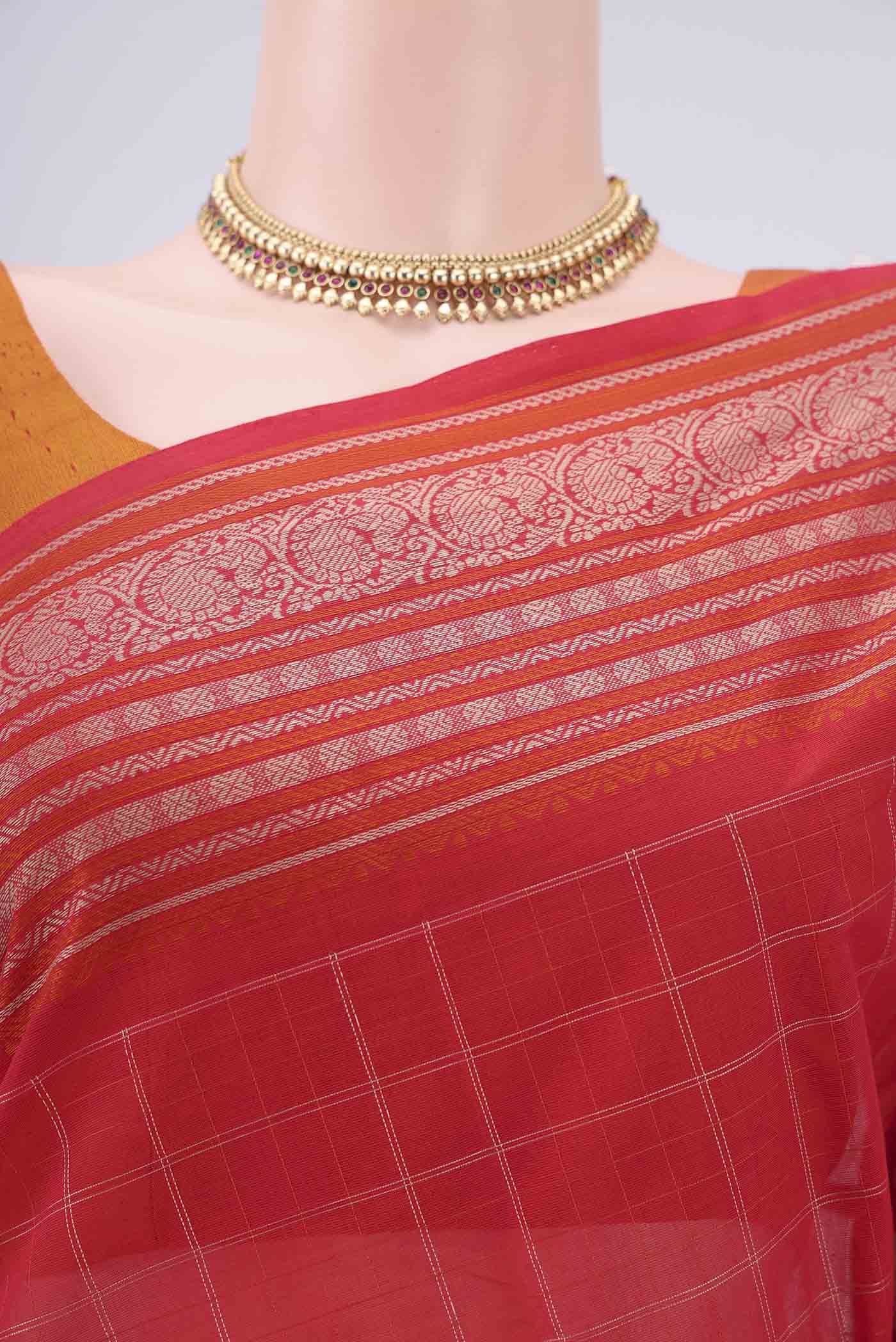 Border image of Red Kanchi Cotton Saree with Checked design on the body and Thread Border. 