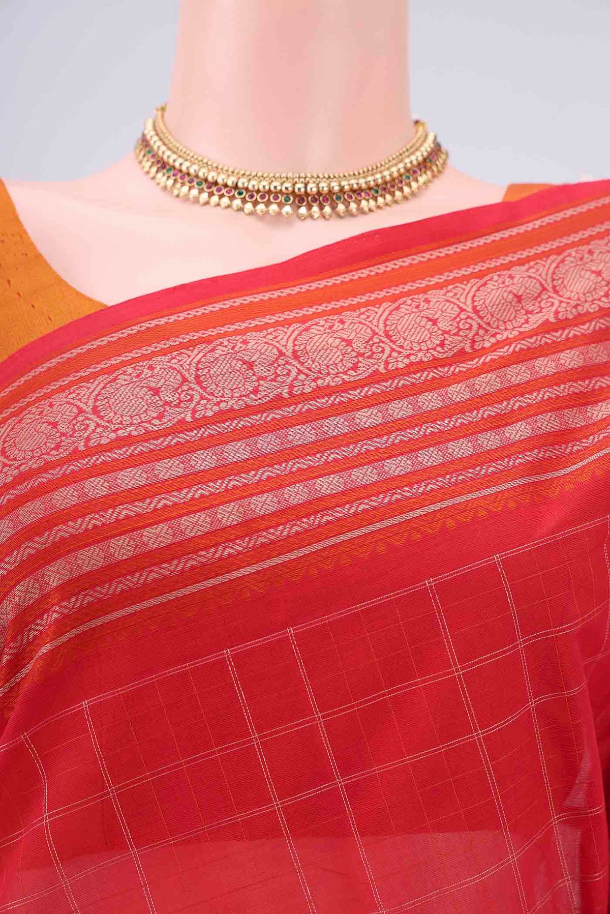 Border image of Red Kanchi Cotton Saree with Checked design on the body and Thread Border. 