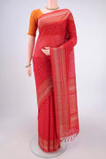 Red Kanchi Cotton Saree with Checked design on the body and Thread Border.  displayed on a mannequin
