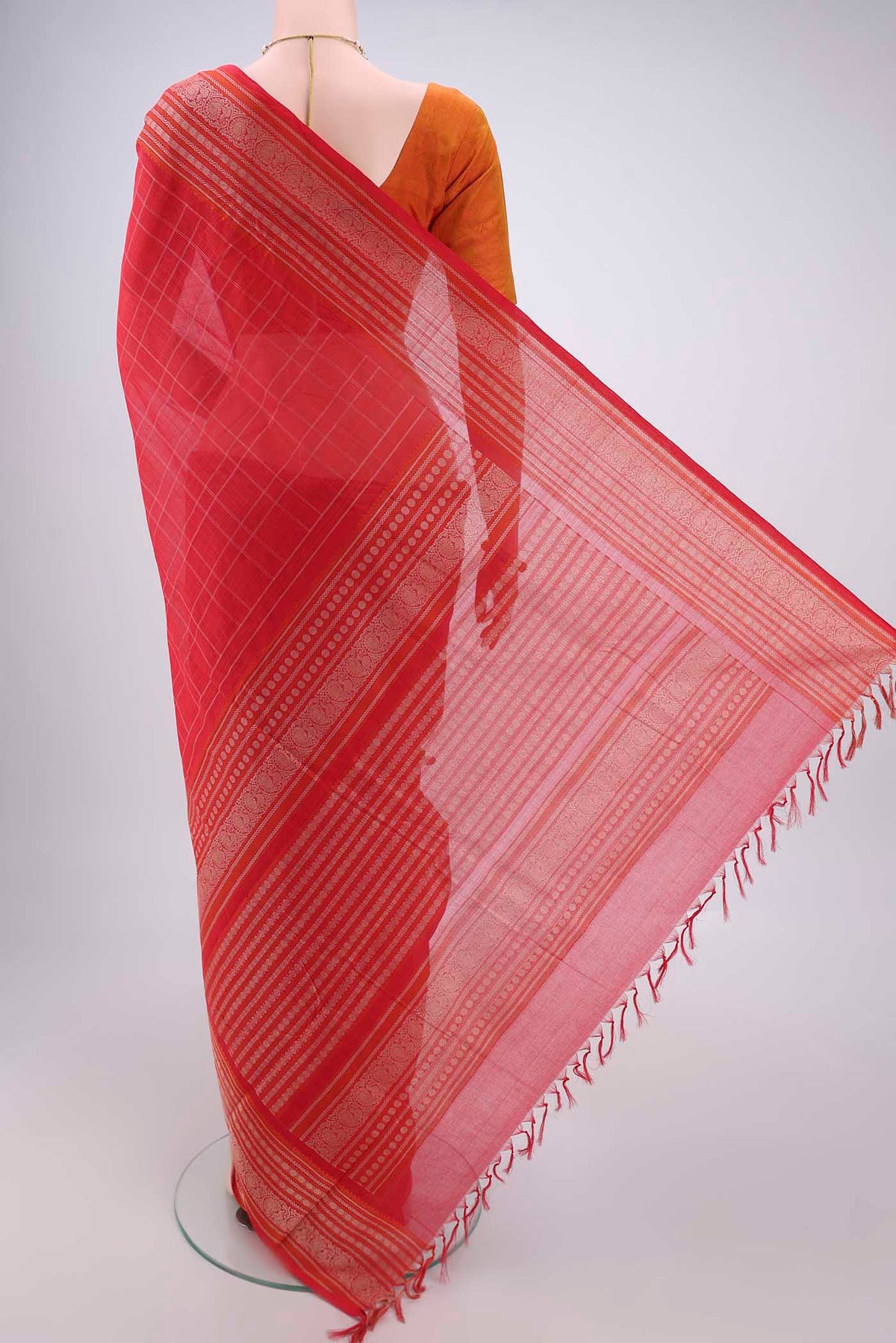 Flat view of Red Kanchi Cotton Saree with Checked design on the body and Thread Border. 