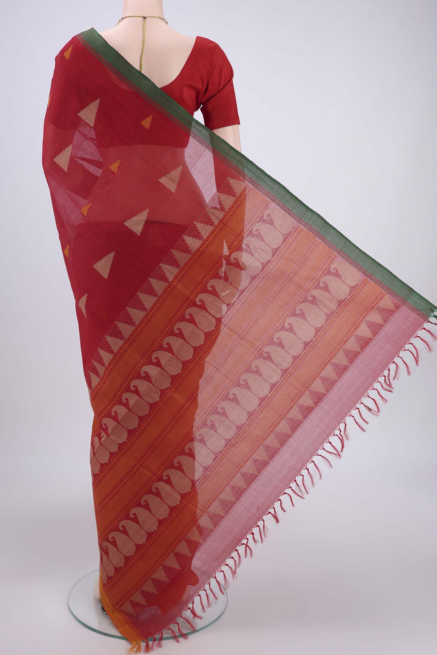 Flat view of Deep Red Coimbatore Cotton Saree with Thread Butta on the body and Thread Border. 