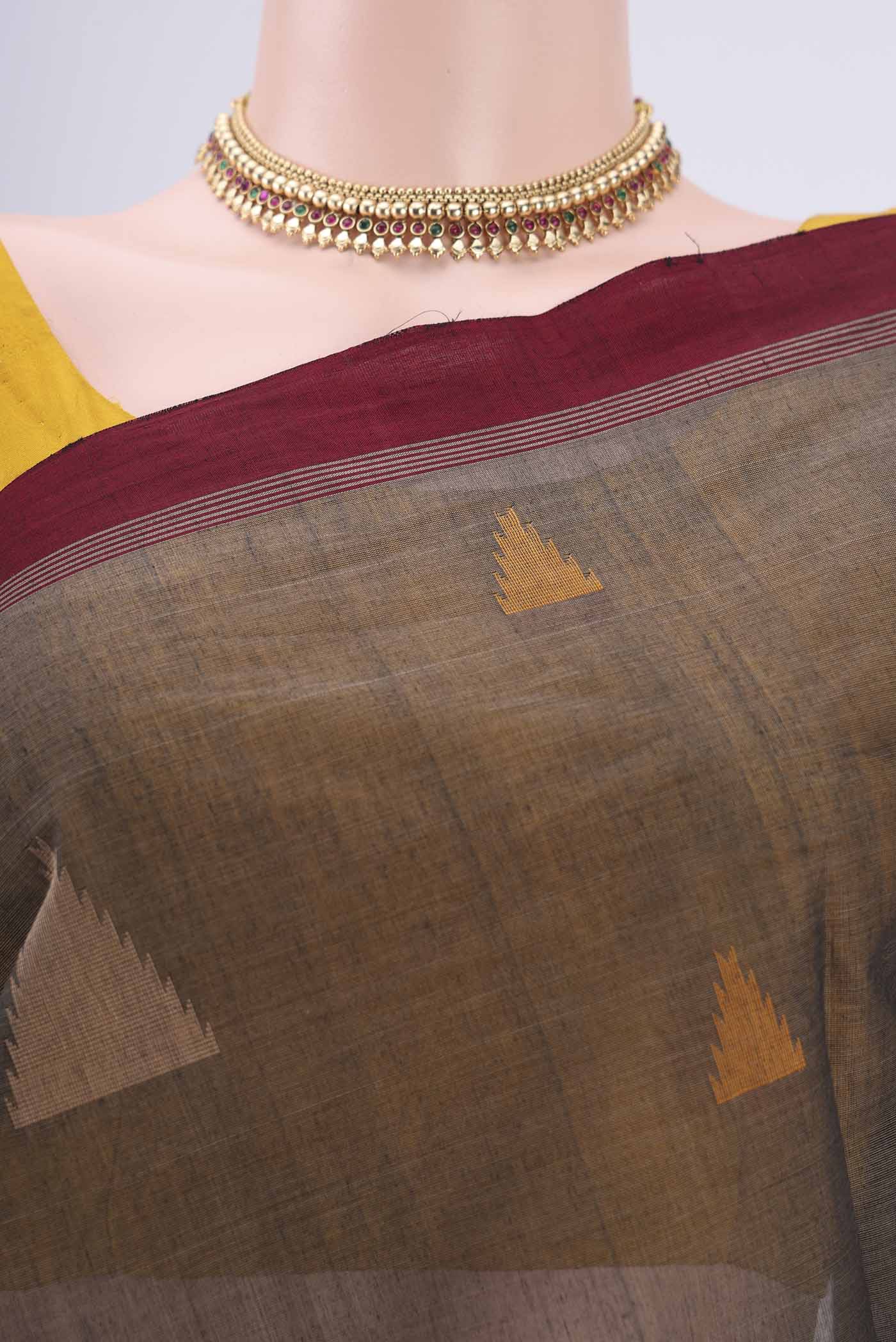 Border image of Black Coimbatore Cotton Saree with Thread Butta on the body and Thread Border. 