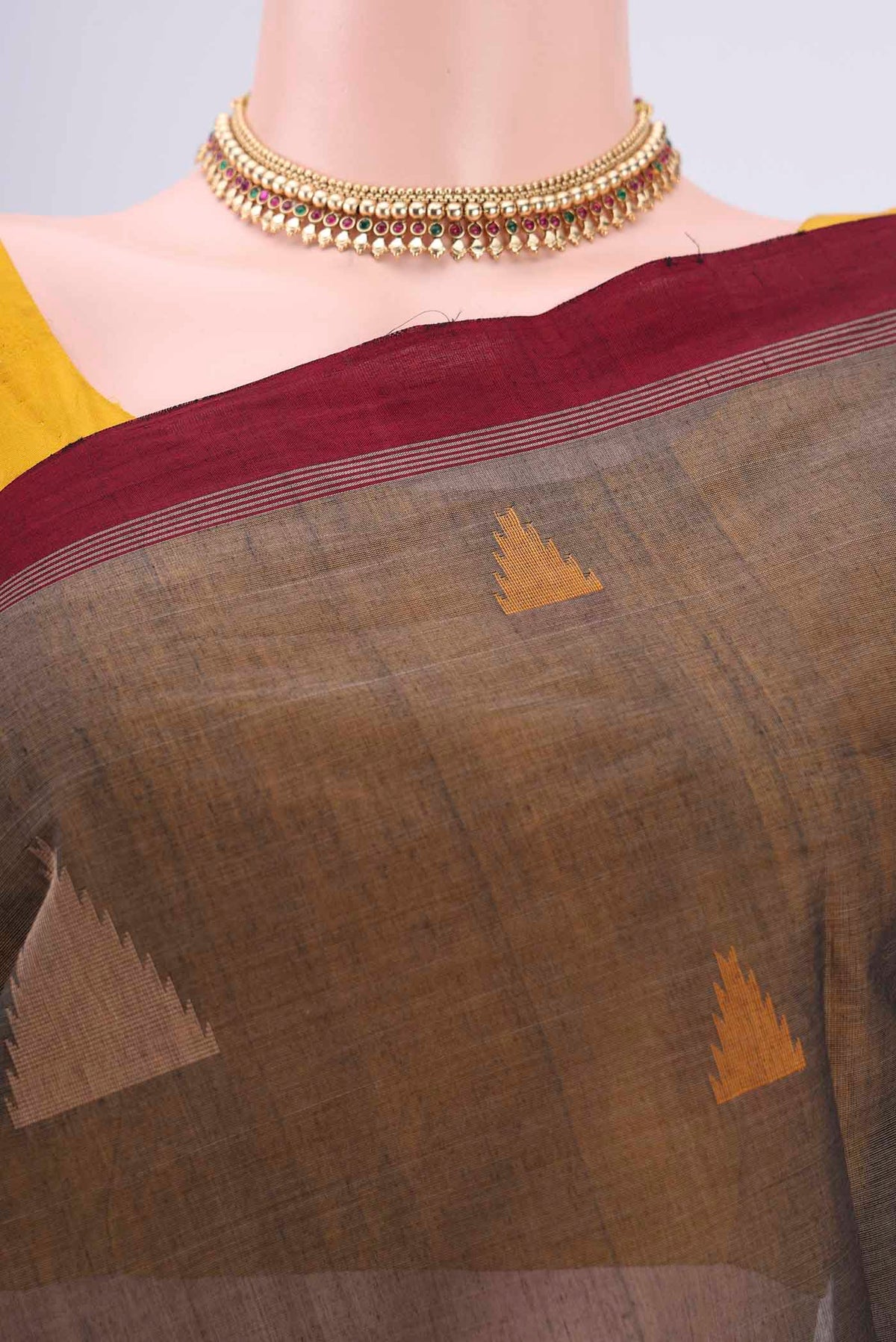 Border image of Black Coimbatore Cotton Saree with Thread Butta on the body and Thread Border. 