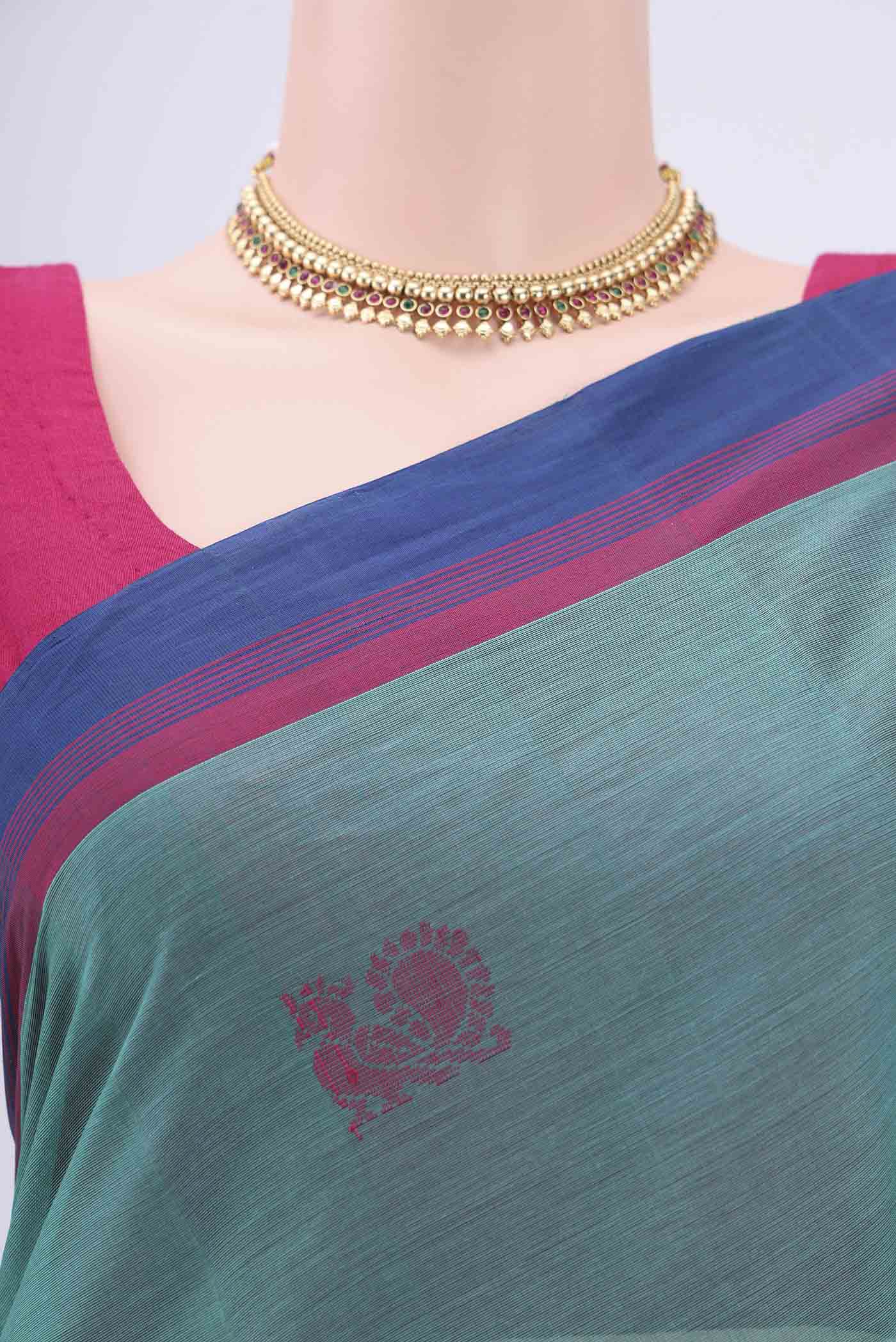 Border image of Sea Green Kanchi Cotton Saree with Thread Butta on the body and Plain Border. 