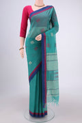 Sea Green Kanchi Cotton Saree with Thread Butta on the body and Plain Border.  displayed on a mannequin