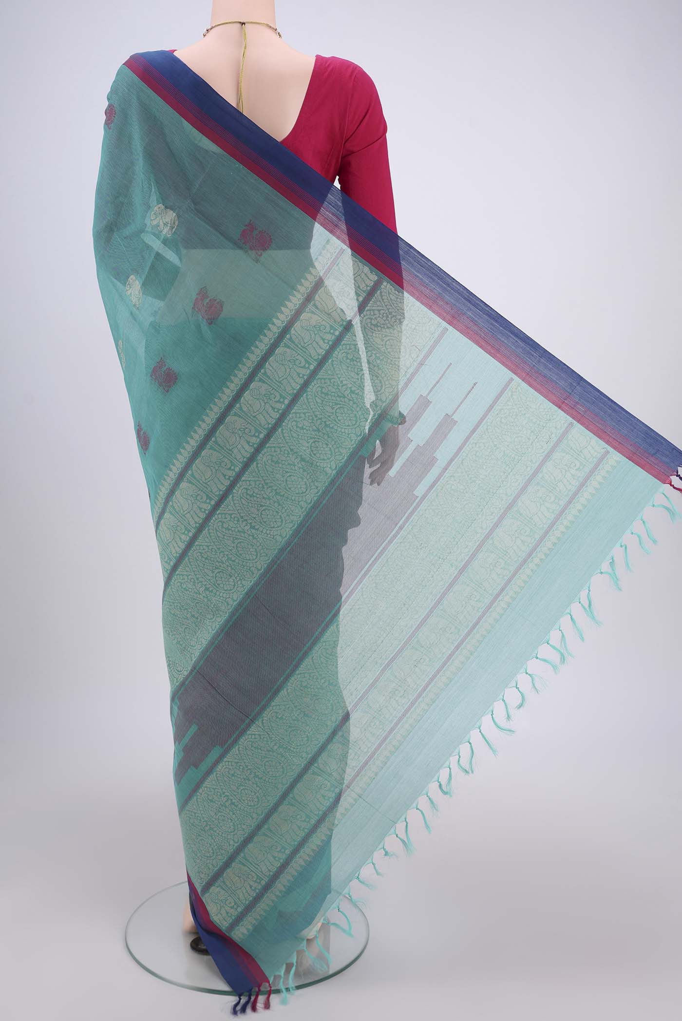 Flat view of Sea Green Kanchi Cotton Saree with Thread Butta on the body and Plain Border. 