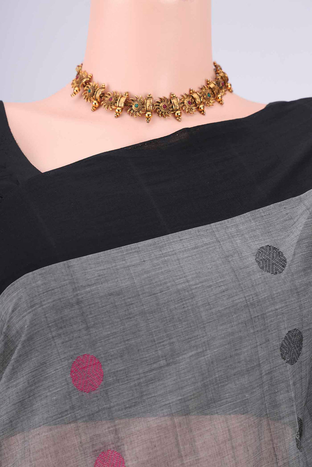 Border image of Grey Coimbatore Cotton Saree with Thread Butta on the body and Plain Border. 