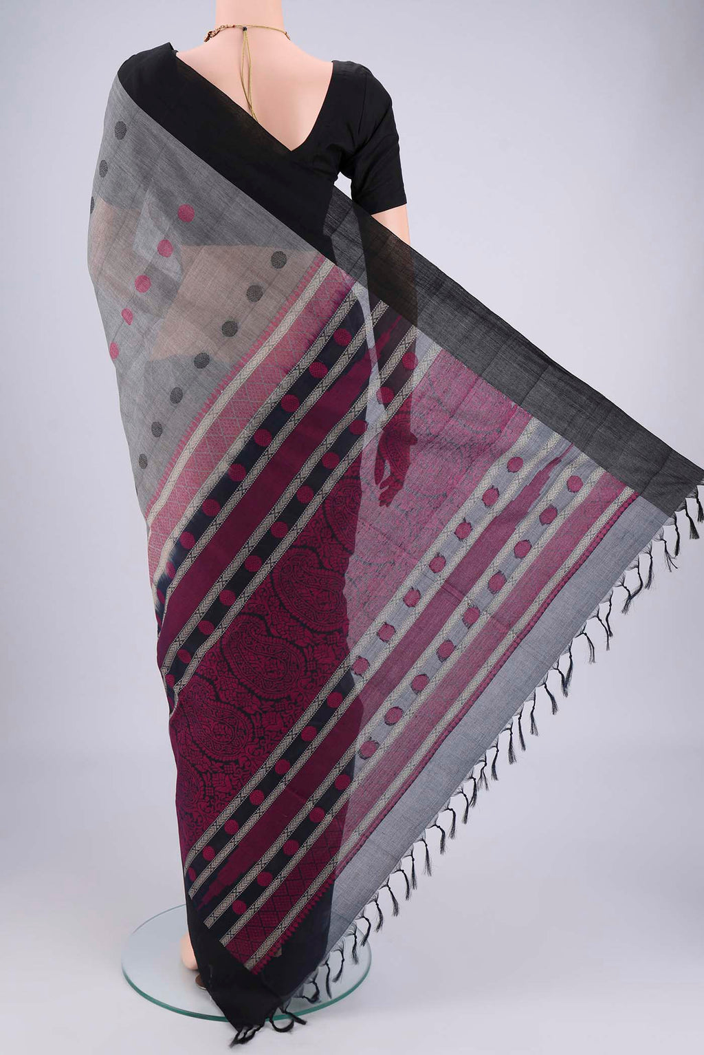 Flat view of Grey Coimbatore Cotton Saree with Thread Butta on the body and Plain Border. 