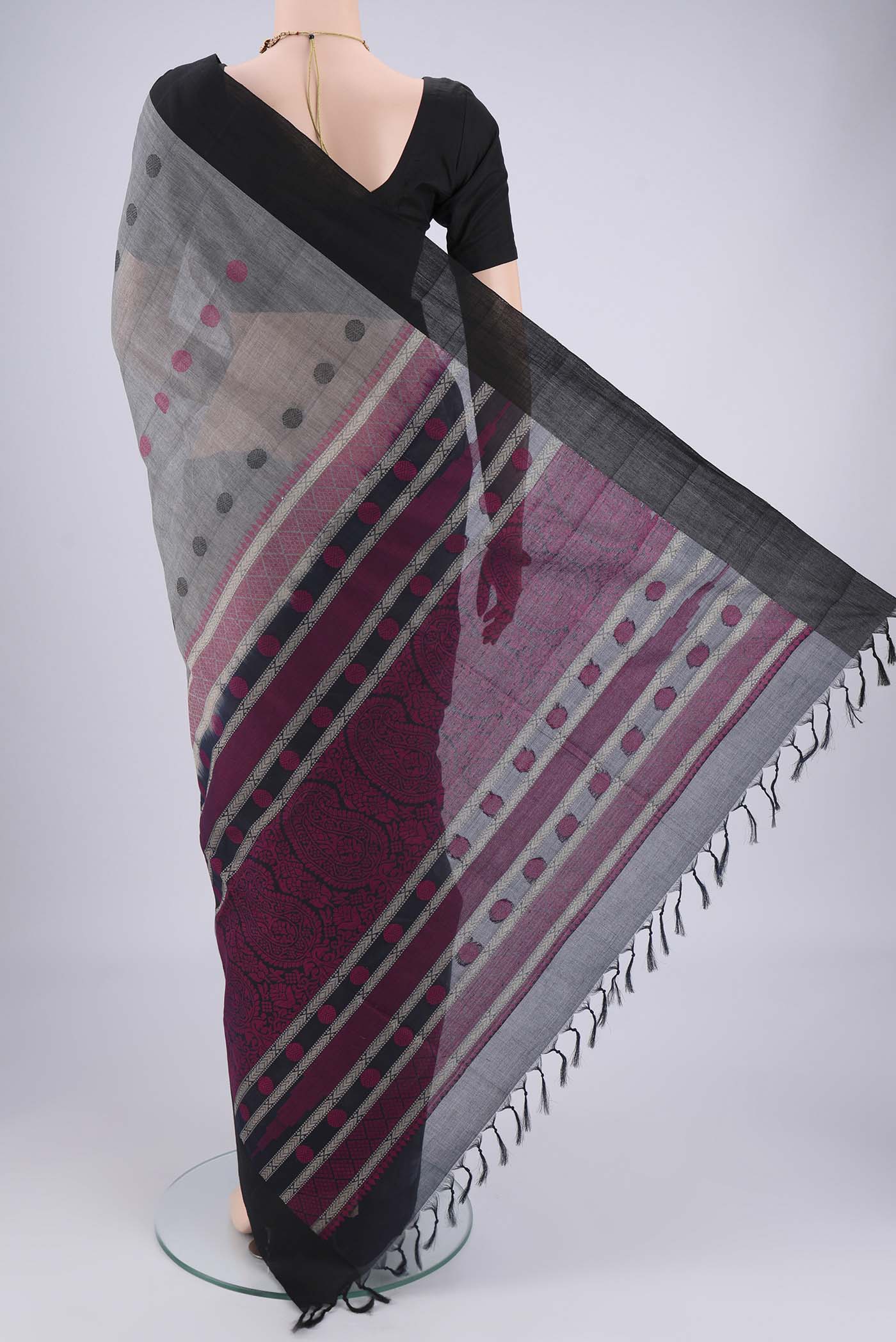 Flat view of Grey Coimbatore Cotton Saree with Thread Butta on the body and Plain Border. 