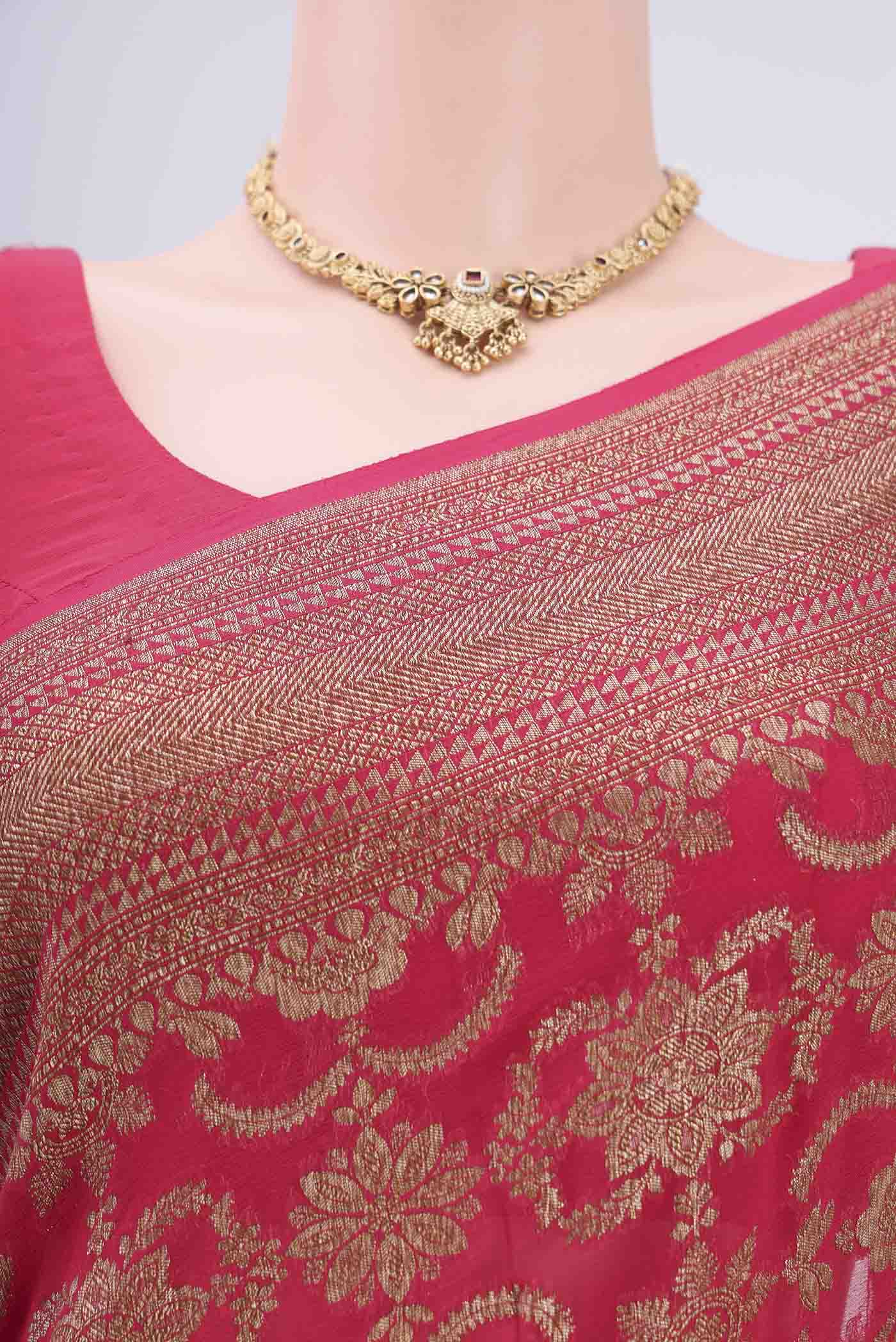 Border image of Dark Pink Banarasi Georgette Saree with Zari Brocade on the body and Zari Border. 