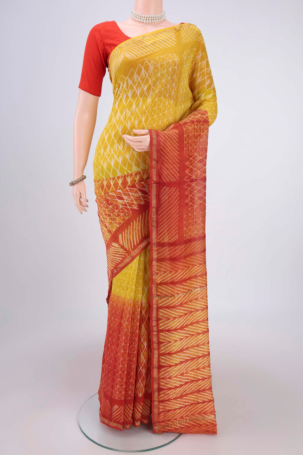 Lemon Yellow Dual Tone Chanderi Silk Saree with Half And Half on the body and Thin Zari Line.  displayed on a mannequin