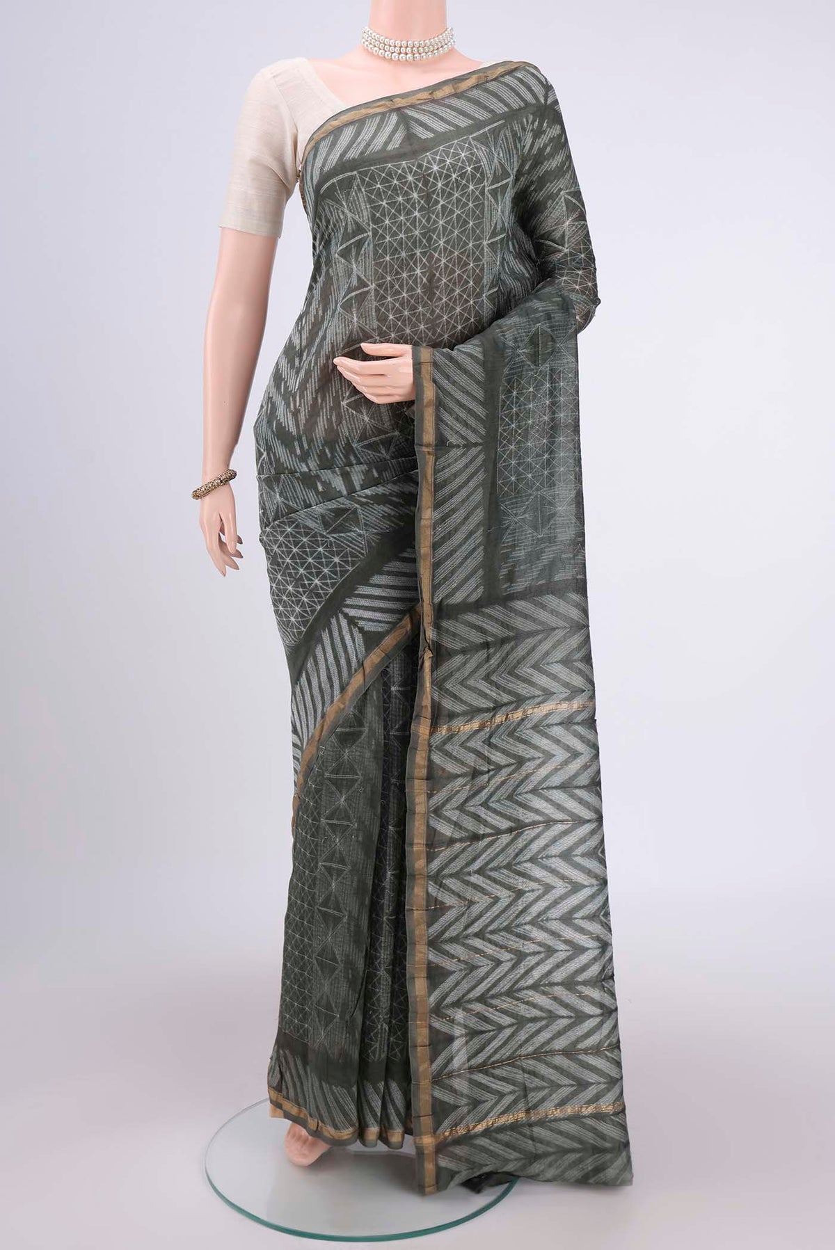 Sage Green Dual Tone Chanderi Silk Saree with Printed design on the body and Thin Zari Line.  displayed on a mannequin