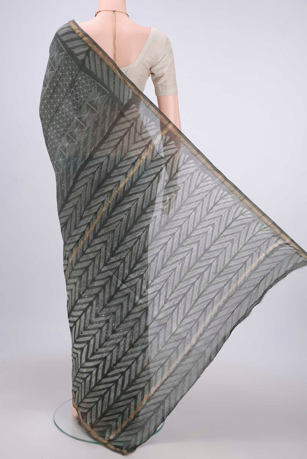 Flat view of Sage Green Dual Tone Chanderi Silk Saree with Printed design on the body and Thin Zari Line. 
