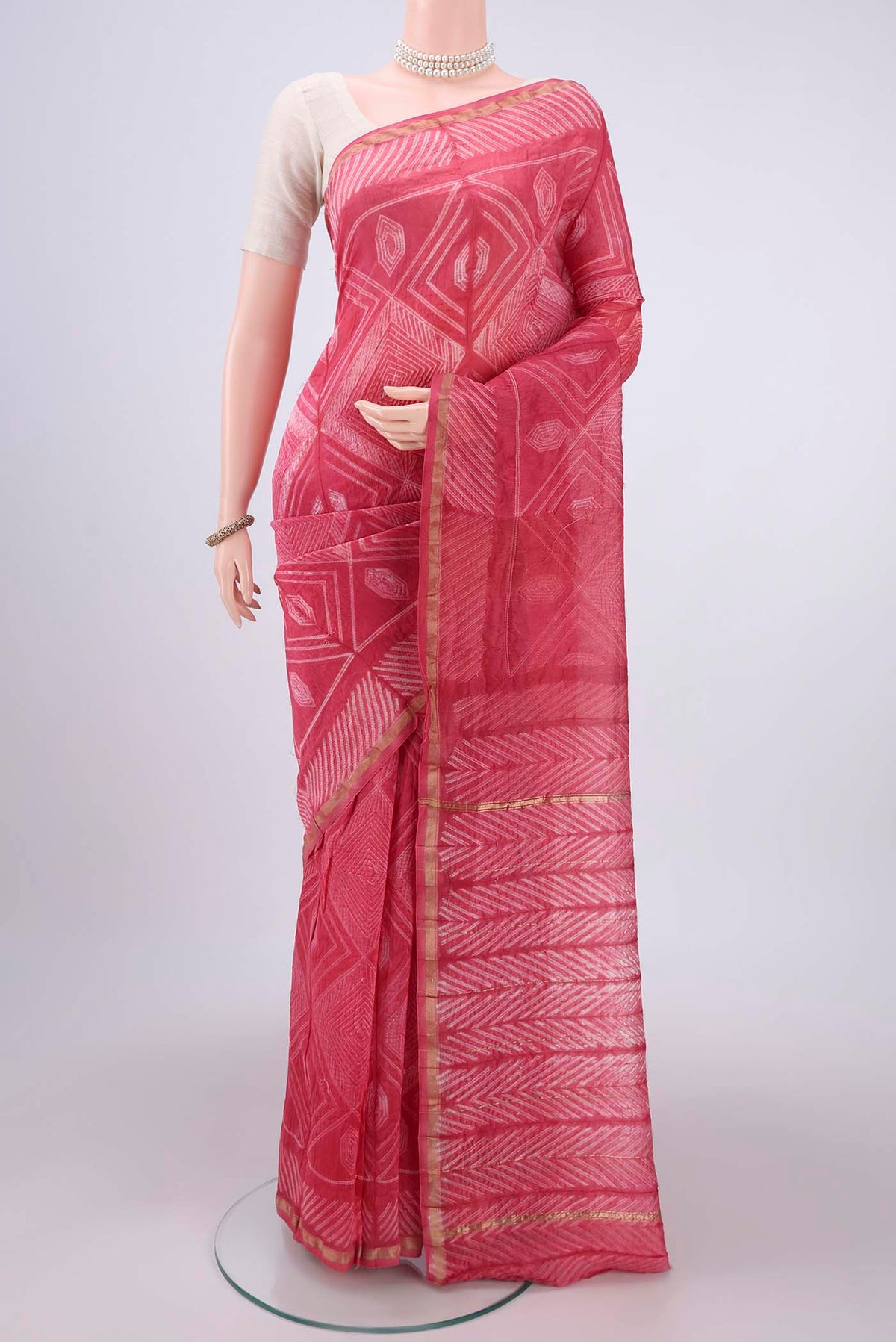 Pink Dual Tone Chanderi Silk Saree with Printed design on the body and Thin Zari Line.  displayed on a mannequin
