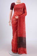 Rust Dual Tone Chanderi Silk Saree with Printed design on the body and Thin Zari Line.  displayed on a mannequin