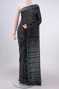 Black Chanderi Silk Saree with Printed design on the body and Zari Border.  displayed on a mannequin