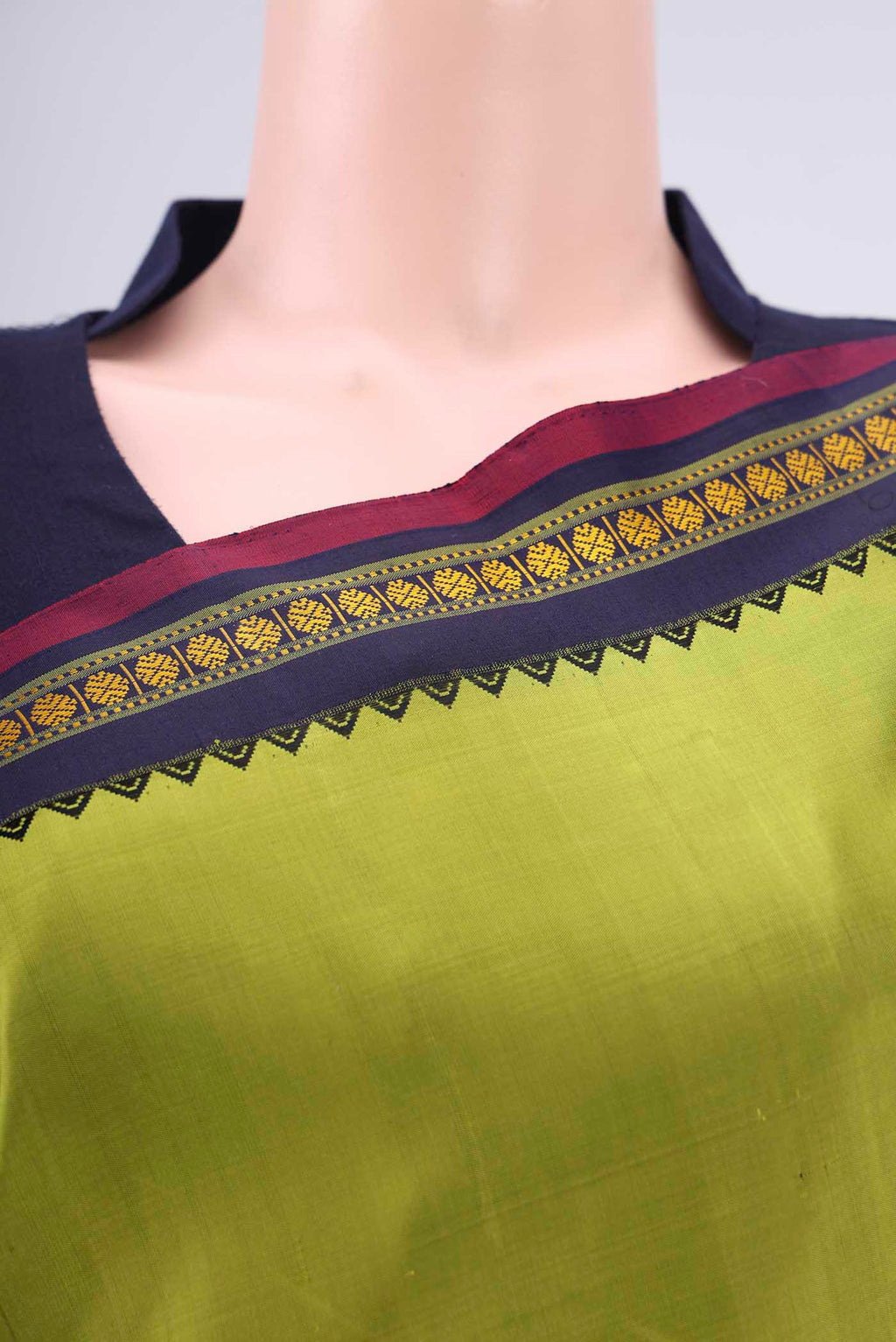 Border image of Light Green Dual Tone Kanjivaram Silk Saree with Plain Body and Thread Border. 