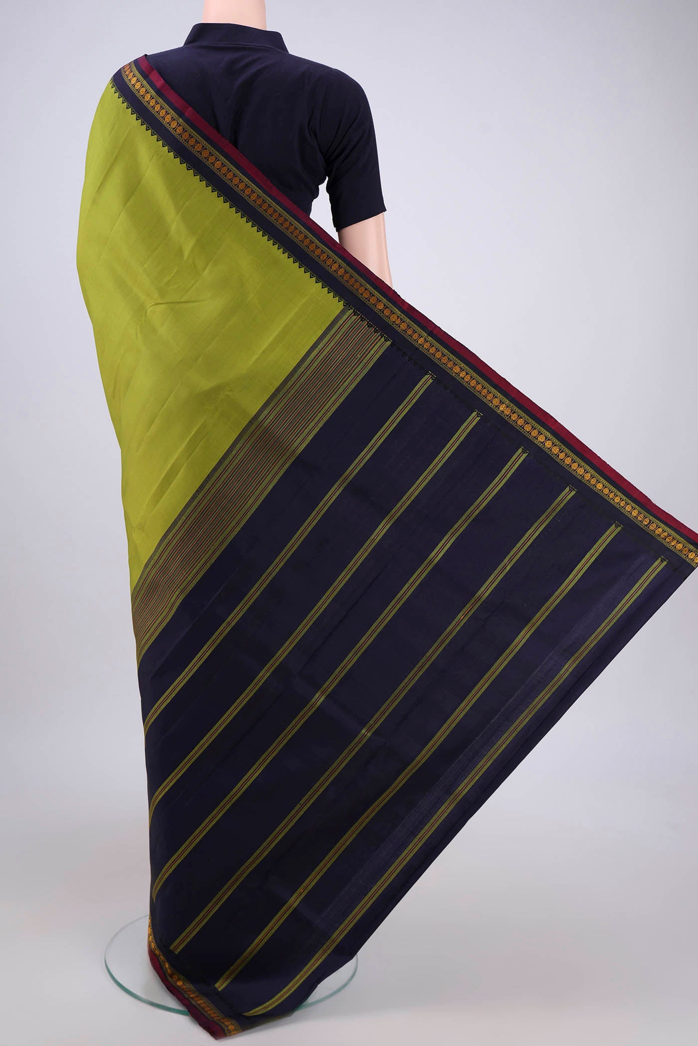 Flat view of Light Green Dual Tone Kanjivaram Silk Saree with Plain Body and Thread Border. 
