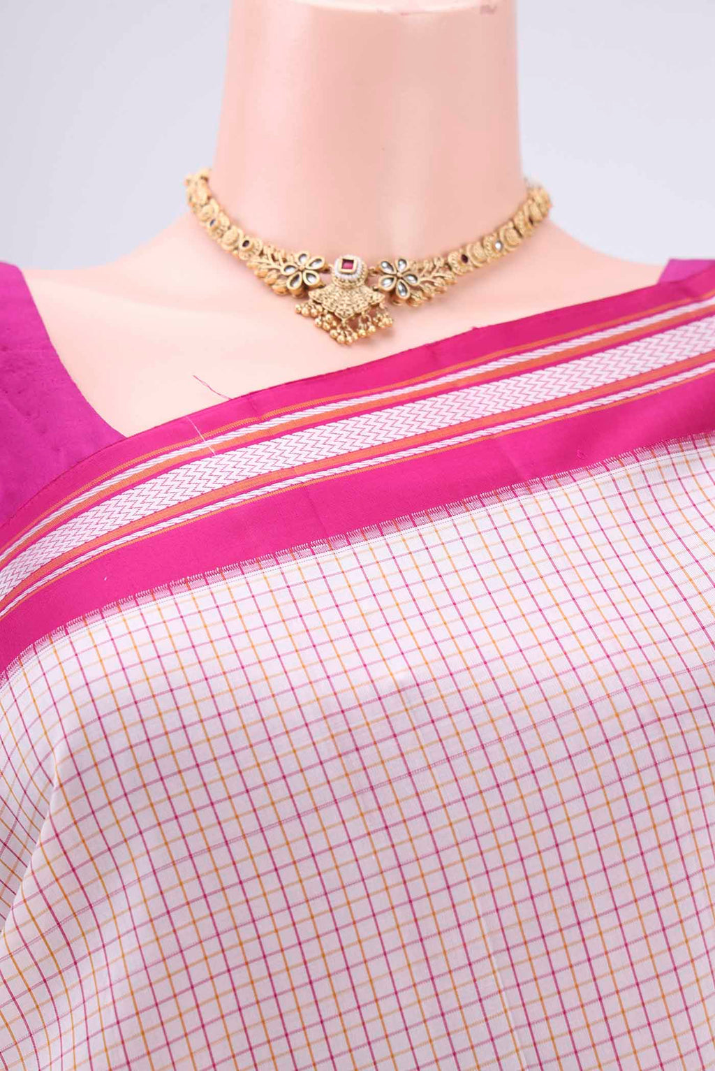 Border image of Off White Dual Tone Kanjivaram Silk Saree with Checked design on the body and Thread Border. 