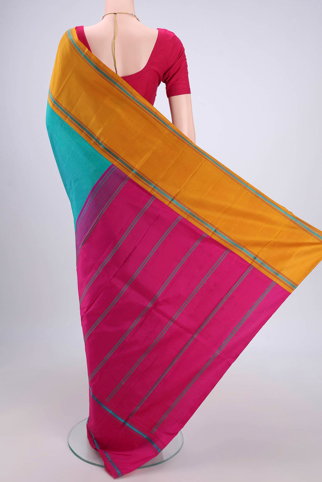 Flat view of Sea Green Kanjivaram Silk Saree with Plain Body and Ganga Jamuna Border. 