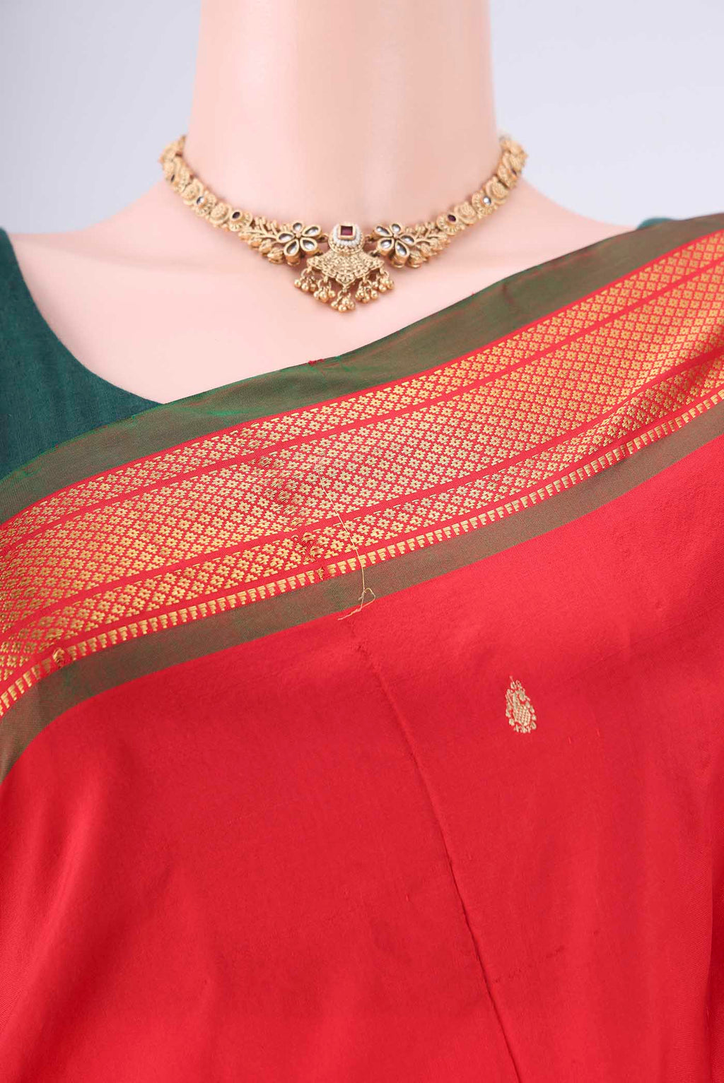 Border image of Maroon Paithani Silk Saree with Zari Butta on the body and Zari Border. 