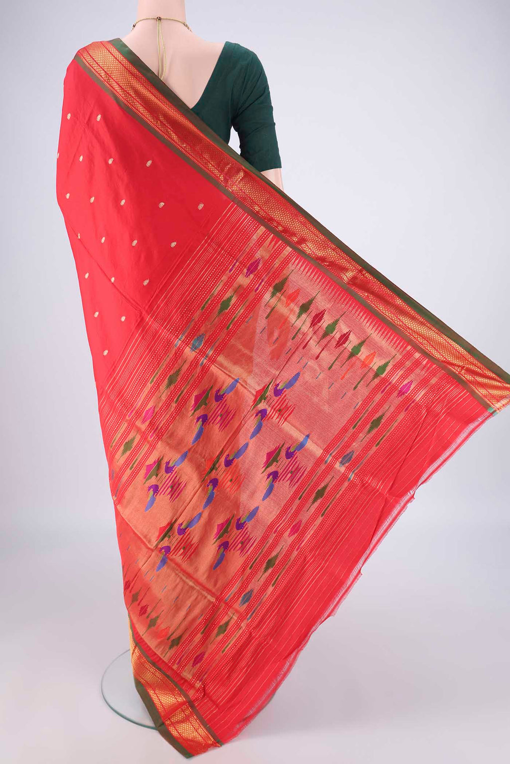 Flat view of Maroon Paithani Silk Saree with Zari Butta on the body and Zari Border. 