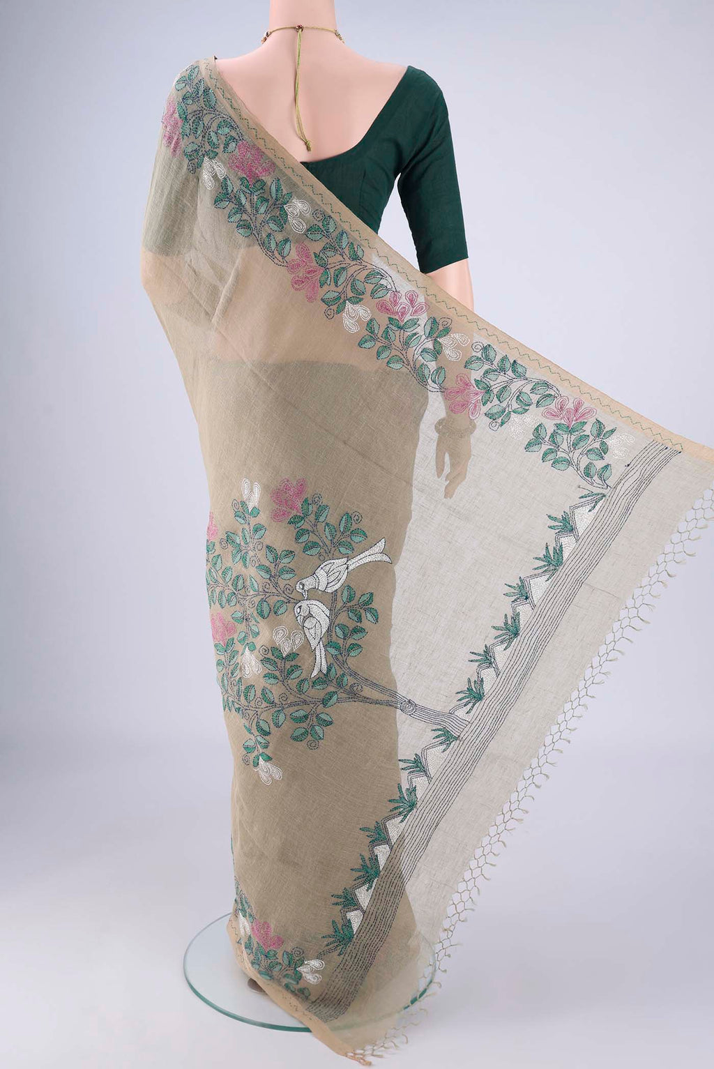 Flat view of Sage Green Linen Cotton Saree with Kantha Work on the body and Thread Border. 