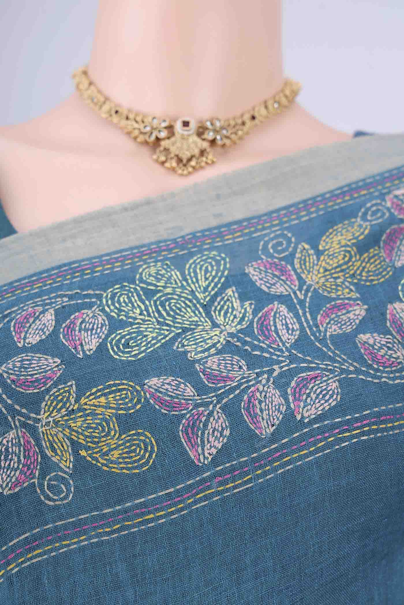 Border image of Blue Linen Cotton Saree with Kantha Work on the body and Thread Border. 