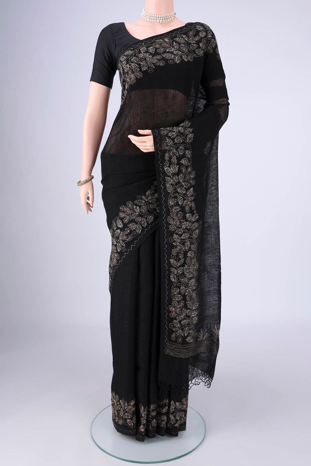 Black Linen Cotton Saree with Kantha Work on the body and Thread Border.  displayed on a mannequin