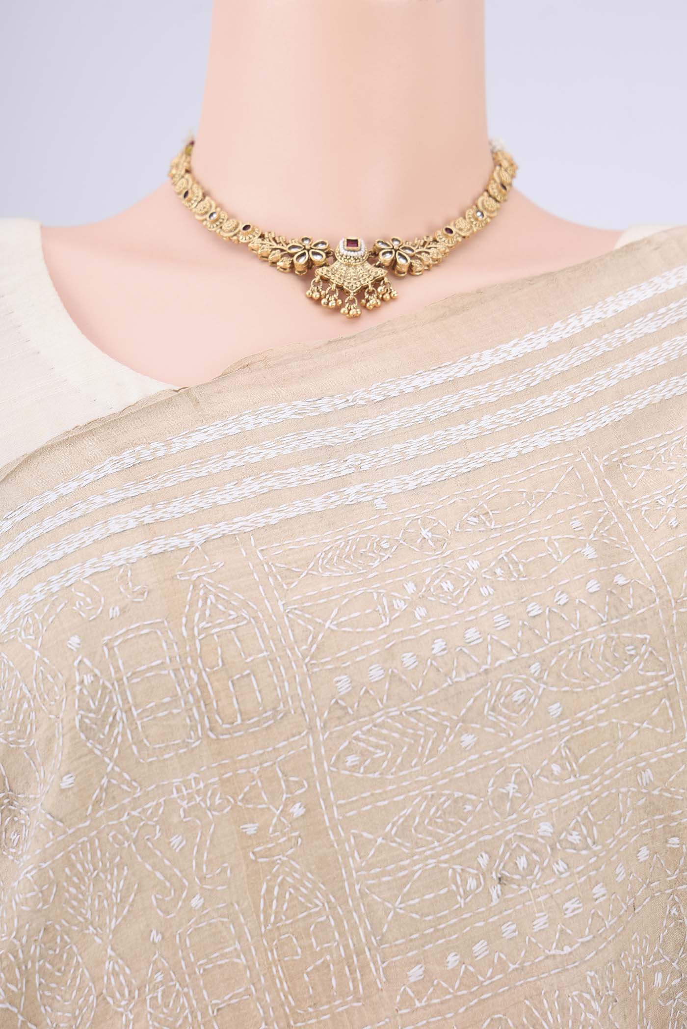 Border image of Beige Kantha Silk Saree with Kantha Work on the body and Thread Border. 