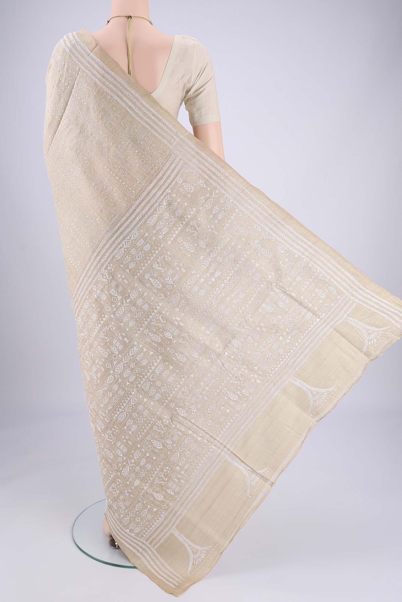 Flat view of Beige Kantha Silk Saree with Kantha Work on the body and Thread Border. 
