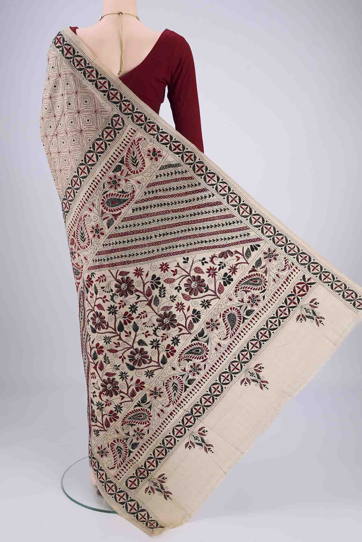 Flat view of Beige Kantha Silk Saree with Kantha Work on the body and Thread Border. 