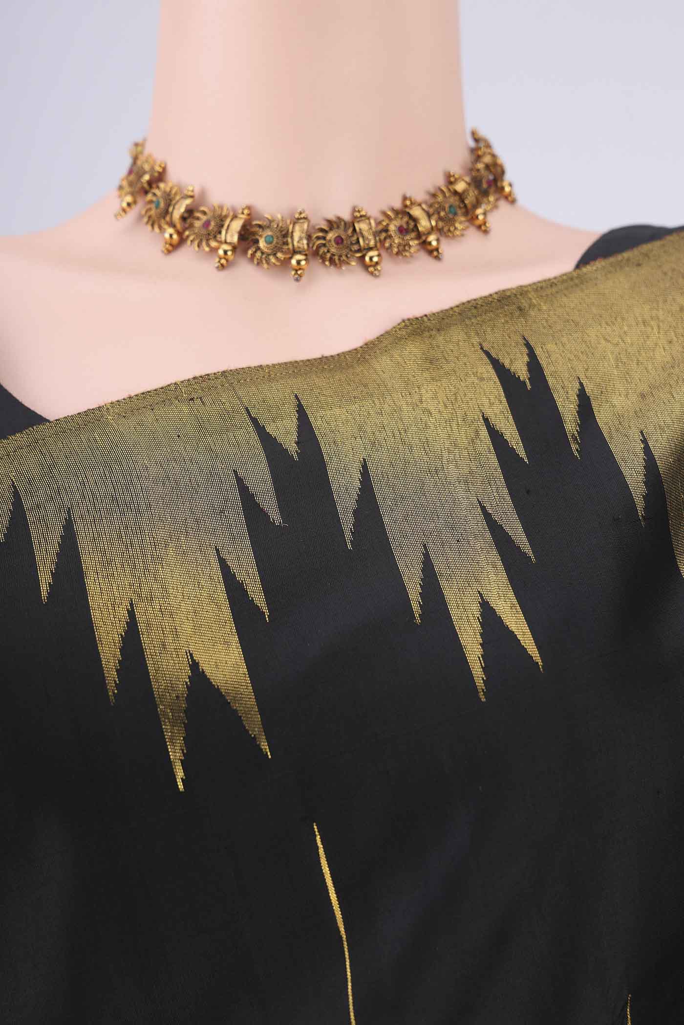 Border image of Black Dual Tone Kanjivaram Silk Saree with Plain Body and Temple Border. 