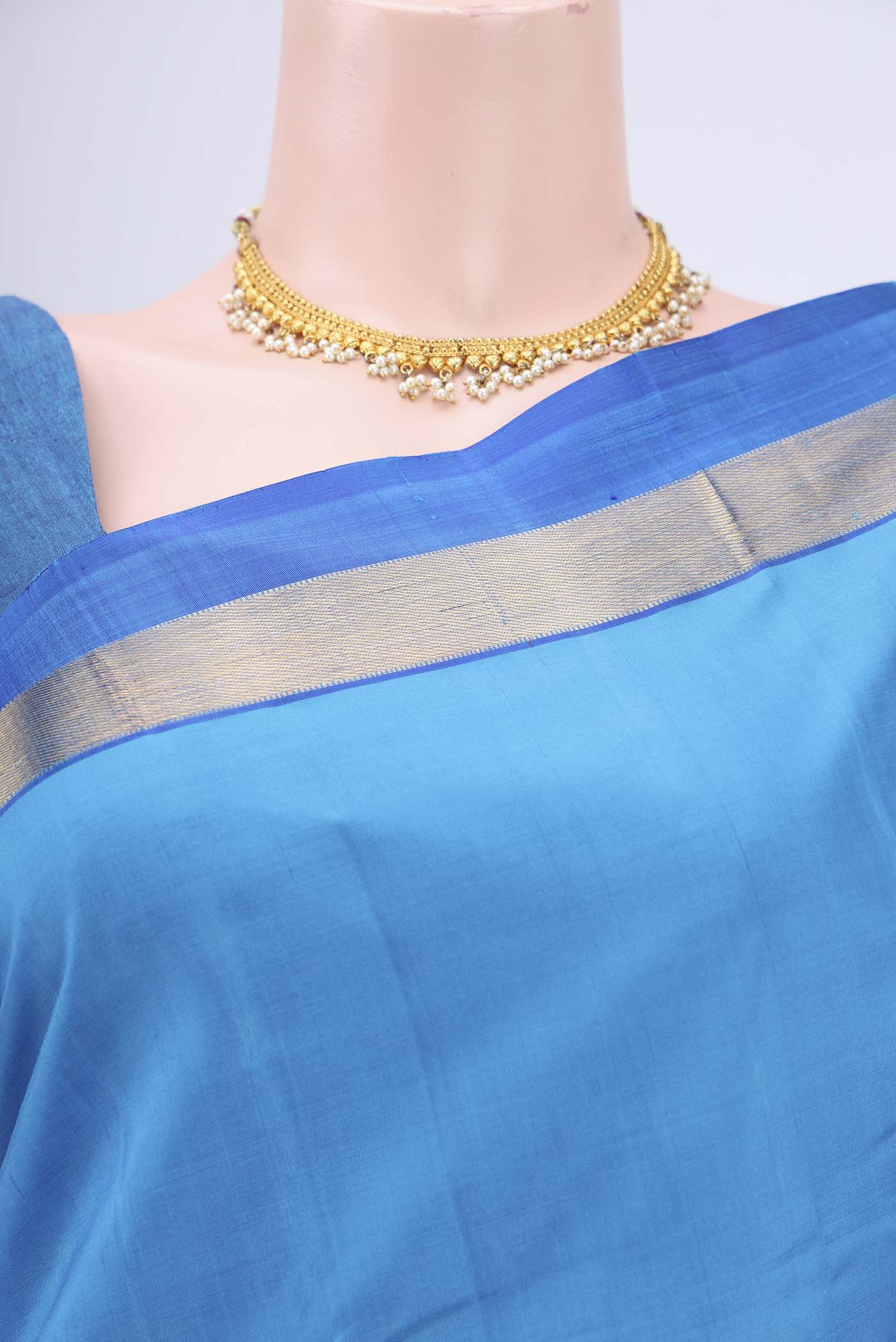 Border image of Blue Dual Tone Kanjivaram Silk Saree with Plain Body and Zari Border. 