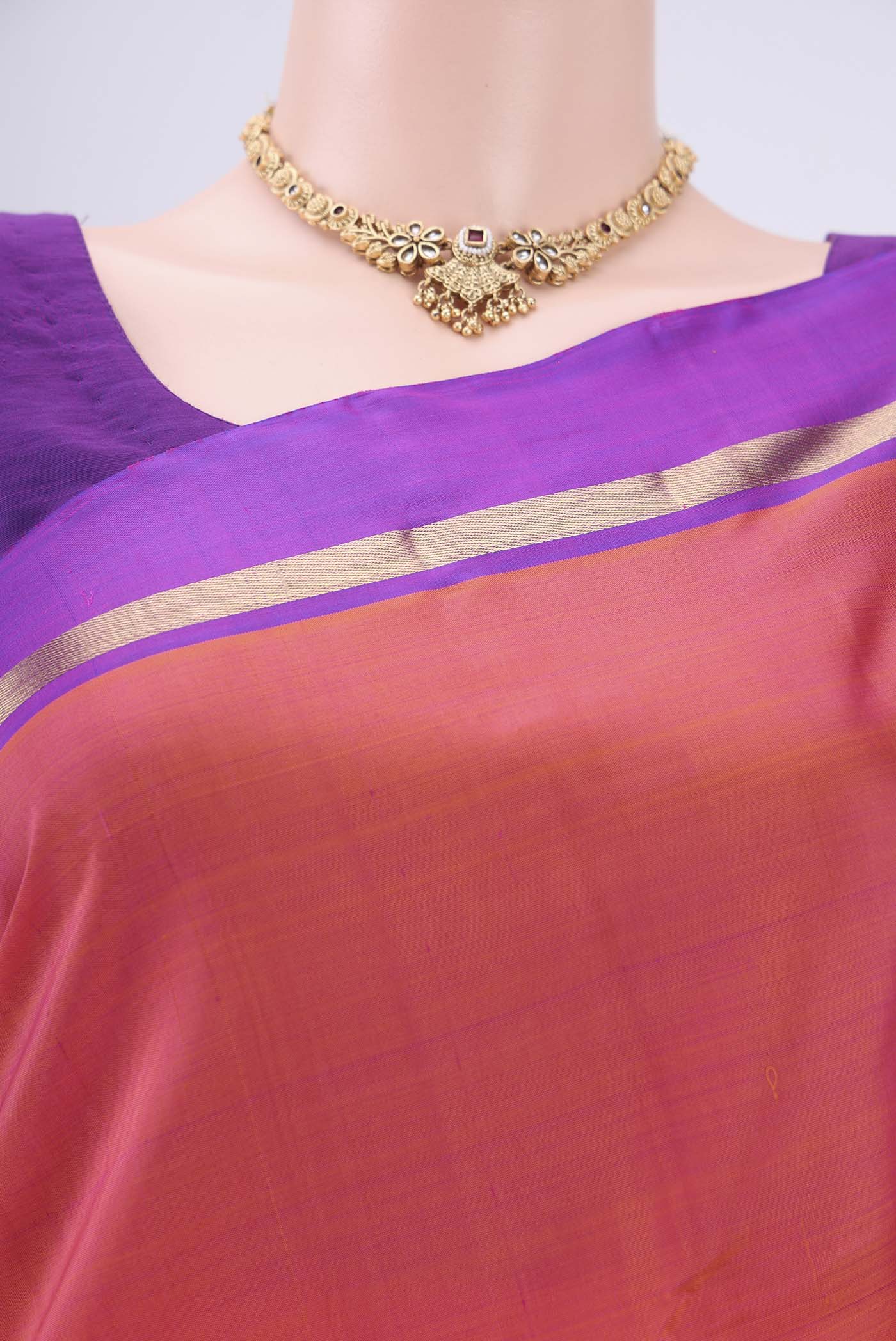 Border image of Orange Kanjivaram Silk Saree with Plain Body and Zari Border. 